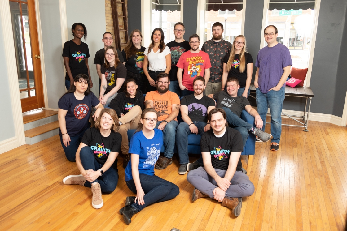 The Gravity Works team is pictured in their Old Town Lansing office space